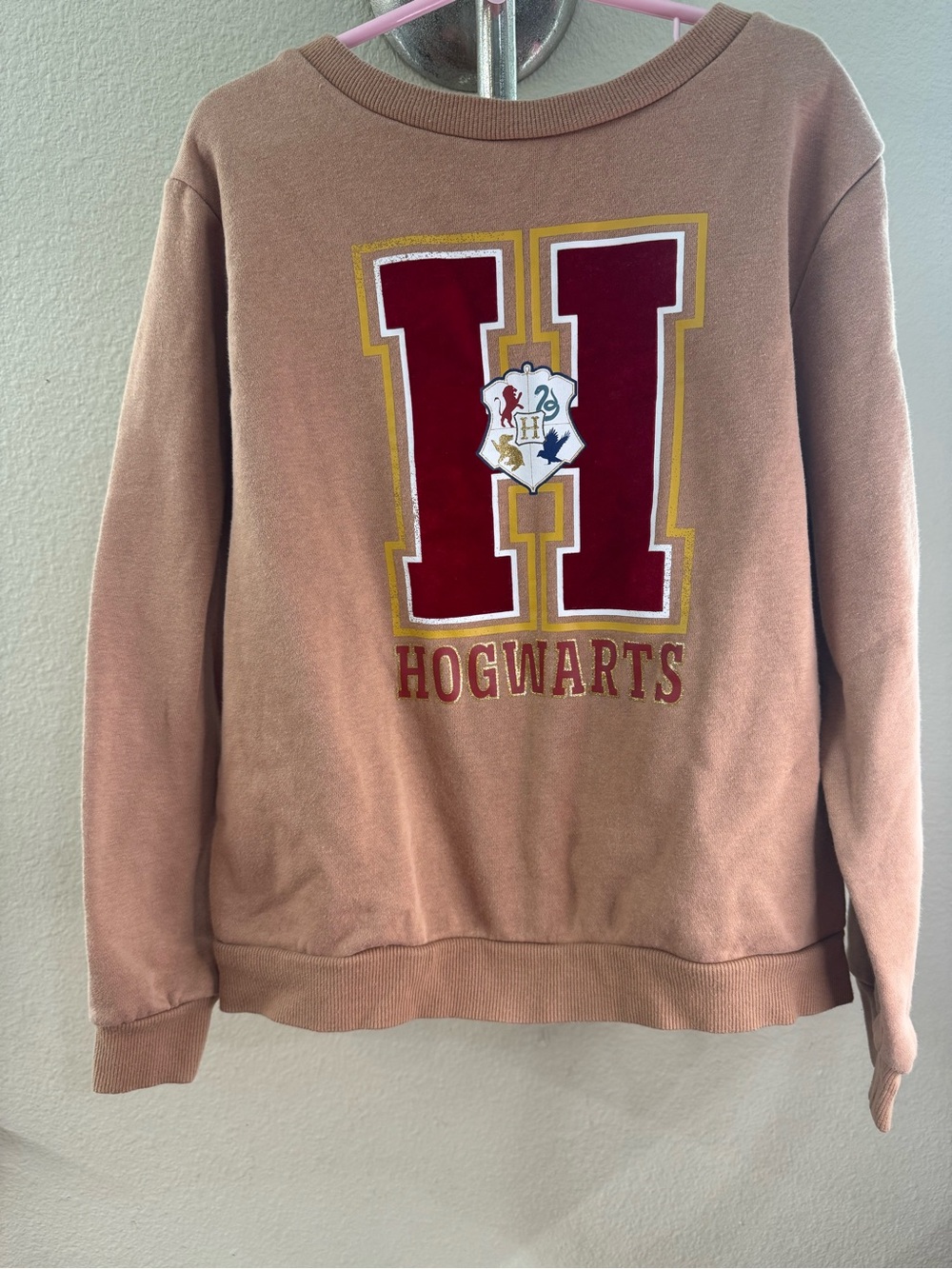 H&M Dusty Rose Hogwarts Sweatshirt with Red and Gold Logo